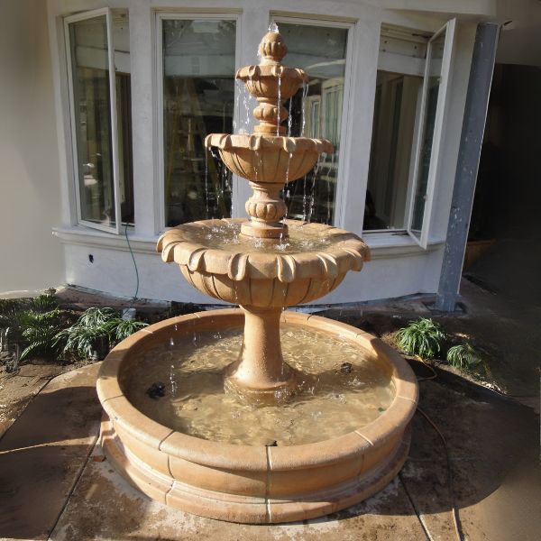 Vistamar Three Tier Pond Fountain on concrete in action.