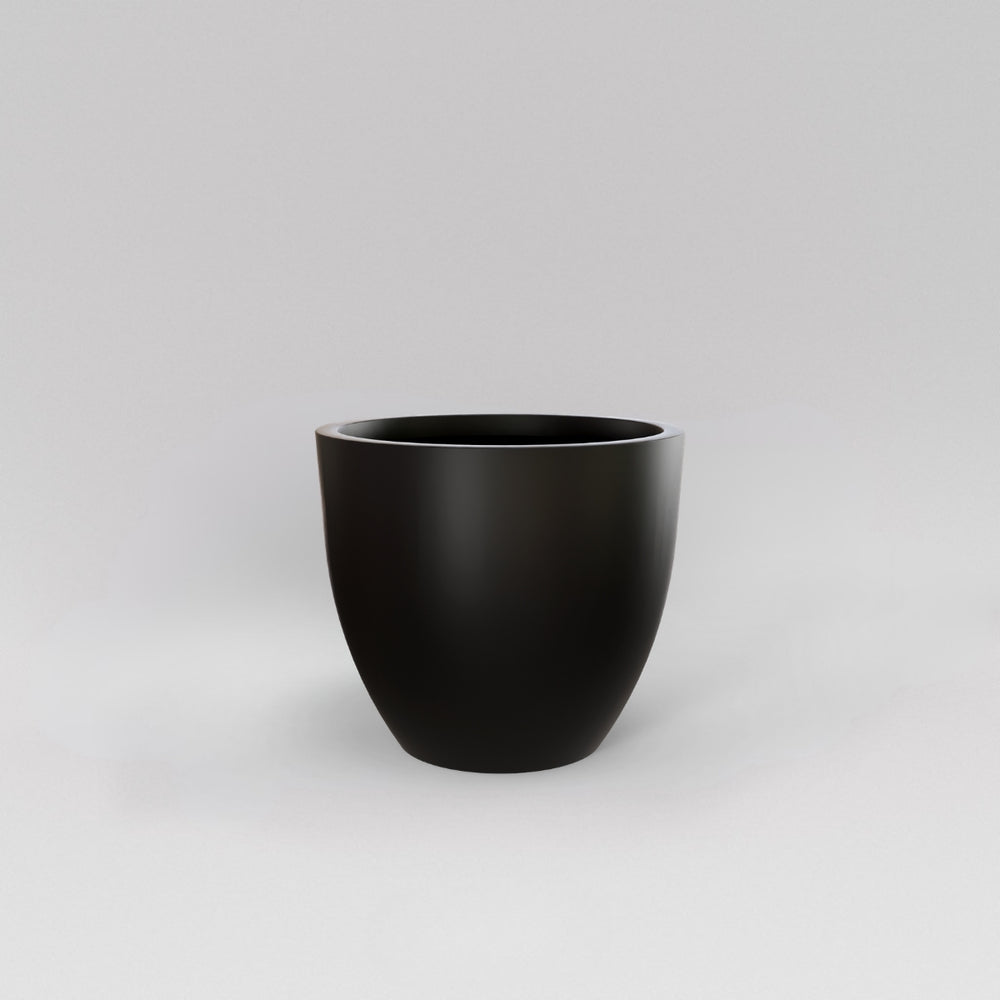 Wannsee Extra Large Round Fiberglass Planter in matte black against gray background.