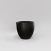 Wannsee Extra Large Round Fiberglass Planter in matte black against gray background.