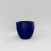 Wannsee Extra Large Round Fiberglass Planter in matte cobalt blue against gray background.
