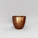 Wannsee Extra Large Round Fiberglass Planter in metallic bronze against gray background.