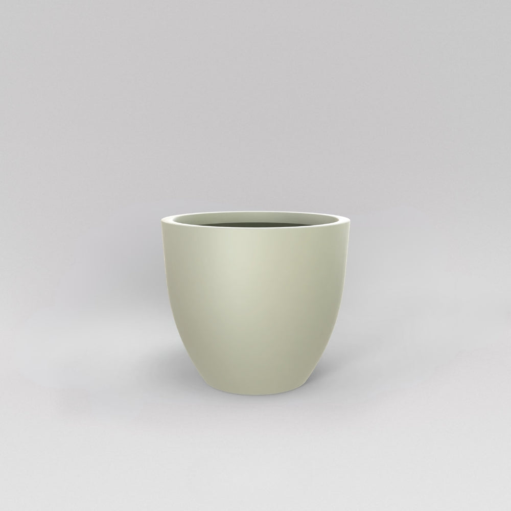 Wannsee Extra Large Round Fiberglass Planter in satin beige against gray background.