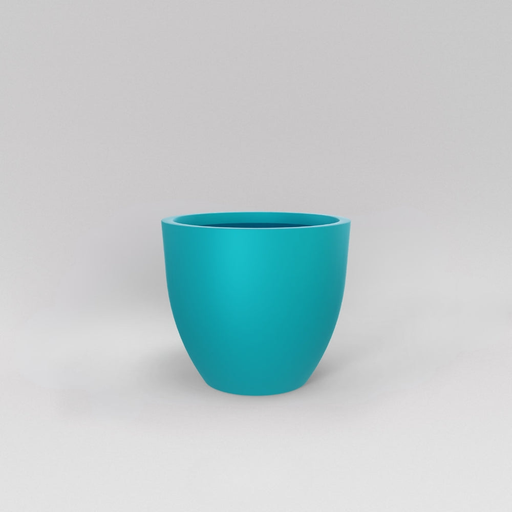 Wannsee Extra Large Round Fiberglass Planter in satin seafoam green against gray background.