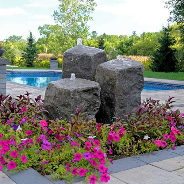 Watershed Triple Fountain Kit in action near swimming pool