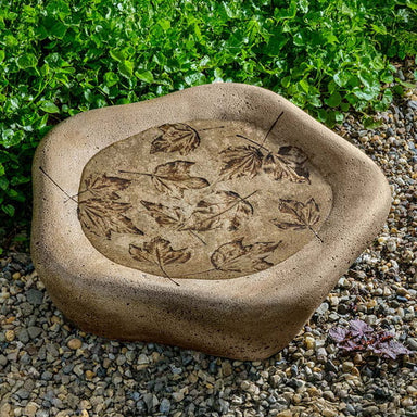 Woodland Leaves Birdbath, Large on concrete in the backyard.