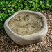 Woodland Leaves Birdbath on pebbles in the backyard.