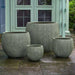 York Planter, Medium - Verdigris Lite on concrete in the backyard