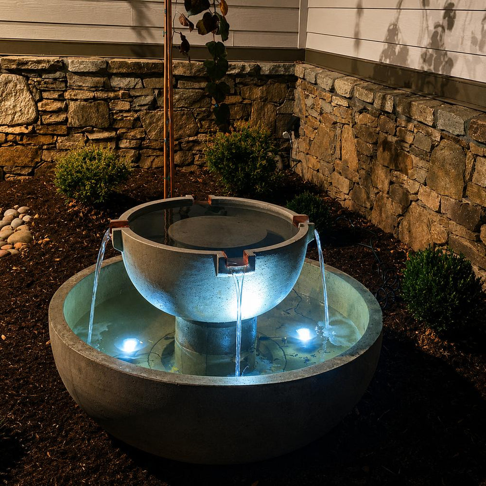 Del Rey Fountain win garden at night with lights running