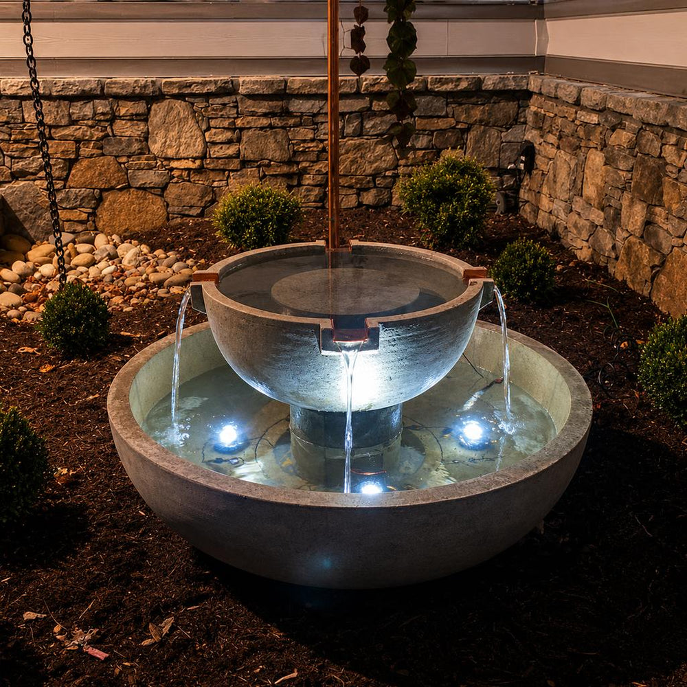 Campania del Rey Fountain at night with three led lights shining