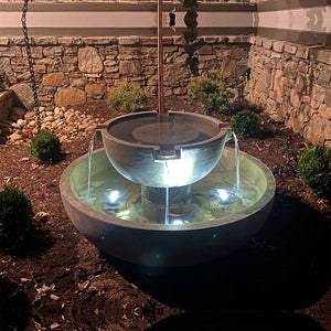 Campania del Rey Fountain at night with three led lights shining
