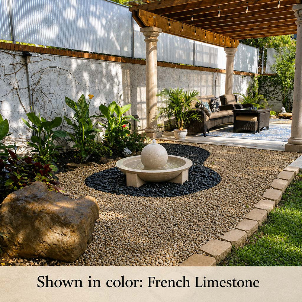 Campania Low Zen Sphere fountain on black gravel in backyard running
