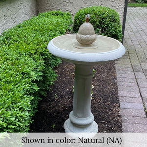 acorn fountain near shrubs