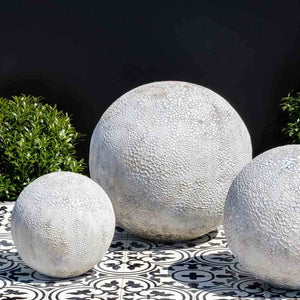 Angkor Spheres - White Coral - Set of 3 on grass in the backyarda