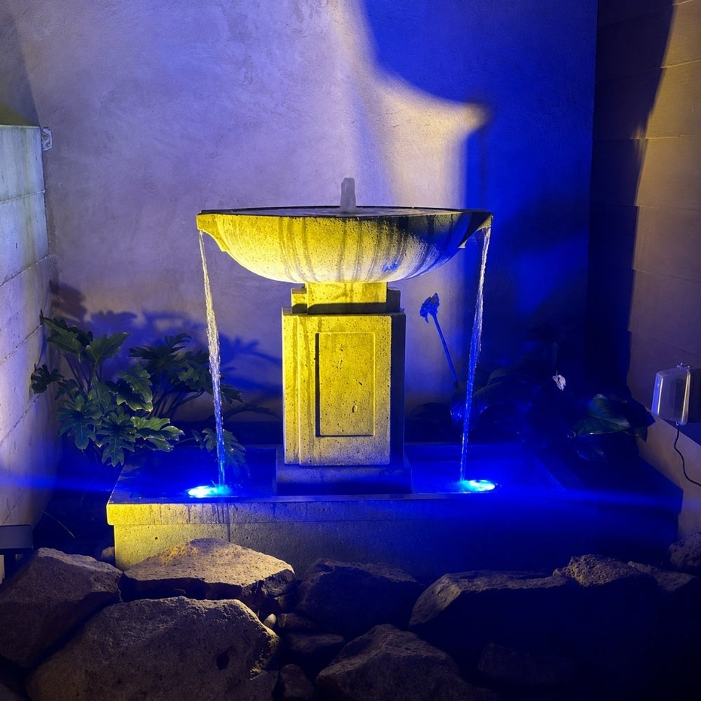 austin fountain with led lights at night
