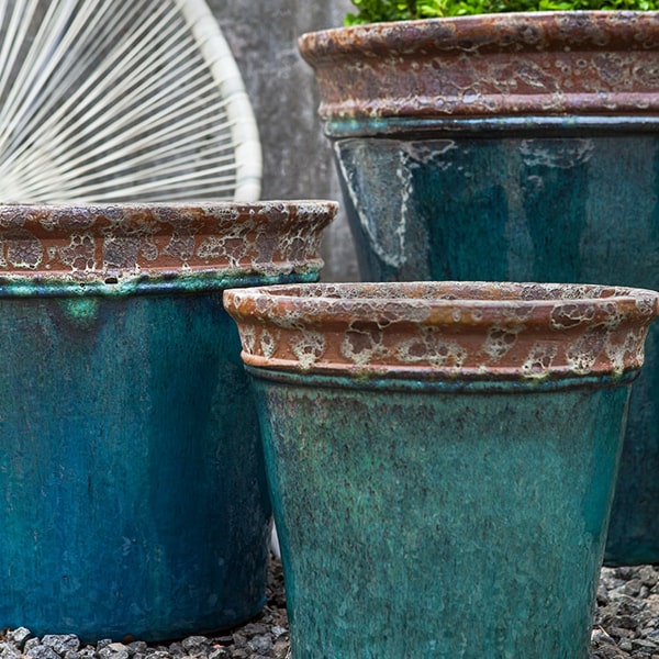 Baia Planter - Beachcomber Aqua - Set of 4 on gravel in the backyard upclose