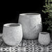 Baleares Planter White Coral S/3 on black and white tiles against black backdrop