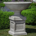 Beauport Urn on pedestal in the backyard