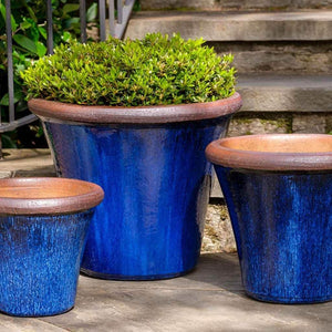 Brighton Planter - Riviera Blue Set of 3 filled with plants near stairs