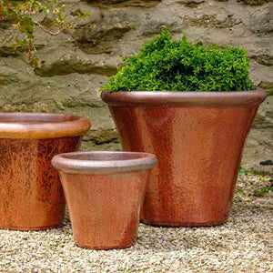 Brighton Planter - Volcanic Red Set of 3 on gravel filled with plants