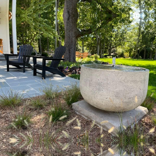 Campania Echo Park Fountain on cement pad in action in backyard