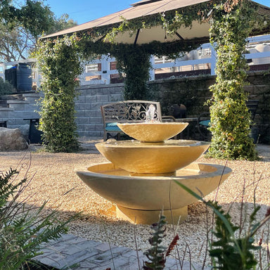 Cascade fountain near gazebo in action