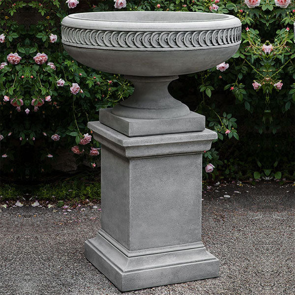 Chatham Urn upclose against pink flowers