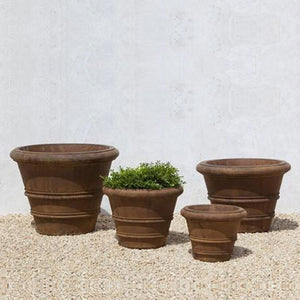 Classic Rolled Rim 11.5″ Planter on gravel in the backyard