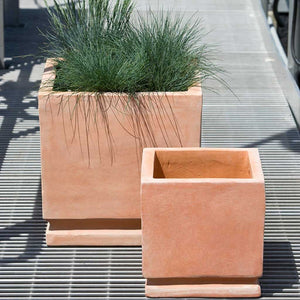 Cuardros Planter - Terra Cotta - S/2 filled with plants in the backyard 