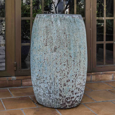 Eden Planter - Verdigris on patio against glass door