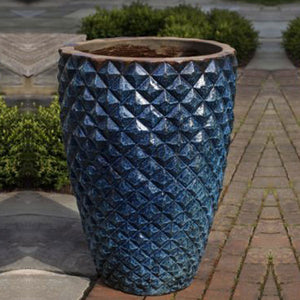 Facet Planter, Tall - Rustic Blue S/1 on concrete in the backyard