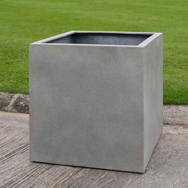 Farnley Planter 1818 - Stone Grey Lite S/1 on concrete in the backyard