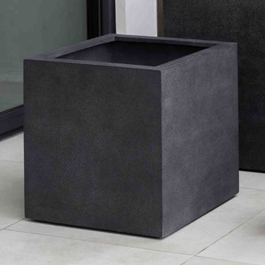 Farnley Planter 3636 - Charcoal Premium Lite - S/1 on patio near glass wall