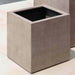 Farnley Planter 3636 - Riverstone Premium Lite S/1 on concrete near a swimming pool