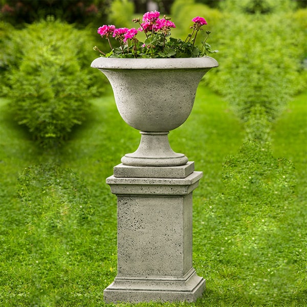 Greenwich Rustic Pedestal with fairfield urn in the backyard