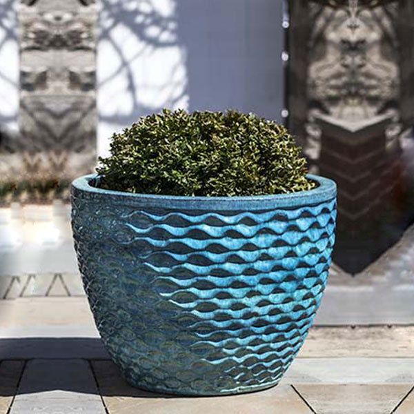 Honeycomb Planter - Aqua - S/4 on concrete filled with plants