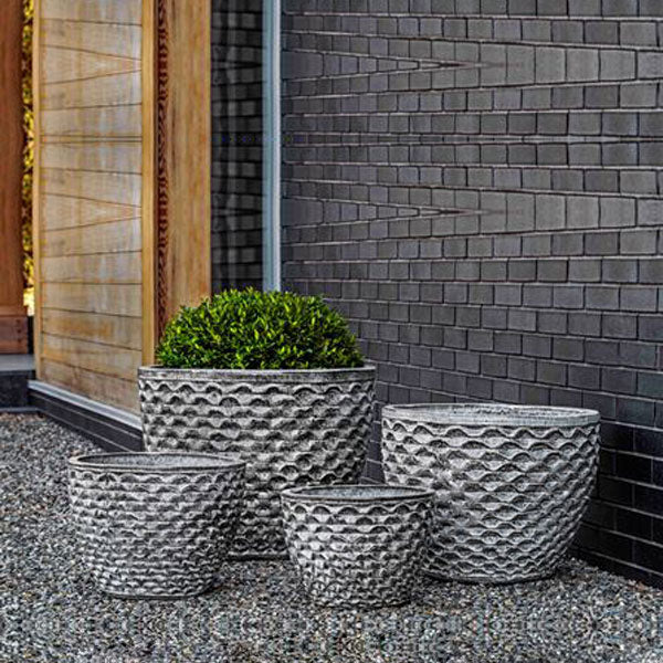 Honeycomb Planter - Heater - S/4 on gravel filled with plants