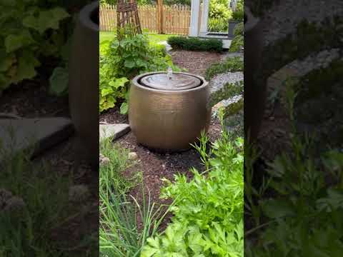 Campania International Bronze Boden Fountain in garden in action