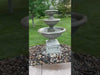 Campania Fonthill Fountain set on small rocks in backyard in action