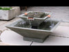 Facet Fountain by Campania on gray stone patio in action