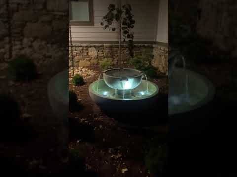 3 led lights shining from the bottom bowl of the Campania Del Rey Fountain