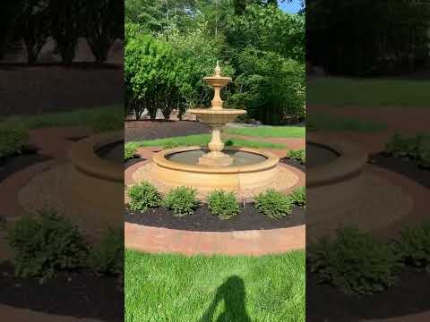 Charleston fountain in basin shown in french limestone in action