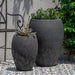 Jardim Plante Volcanic Coral filled with plants near a chair