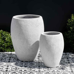 Jardim Planter White Coral S/2 on black and white tiles beside plants