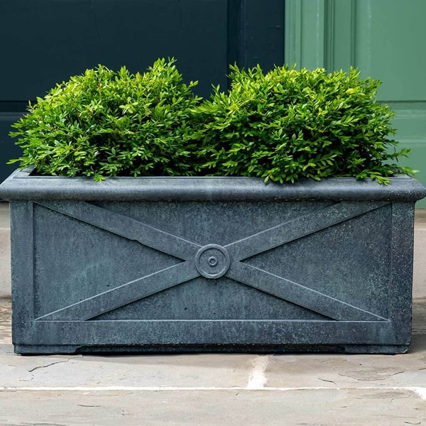 Large Directoire Windowbox Planter filled with plants in the backyard