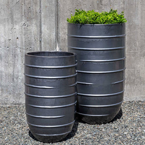 Logis Planter, Tall - Metal Grey - S/2 on gravel filled with plants