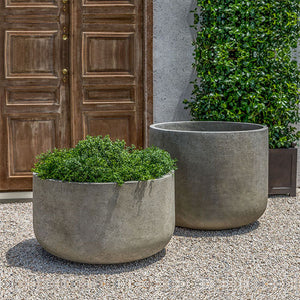 Low Tribeca Planter, Extra Large filled with plants beside empty planter