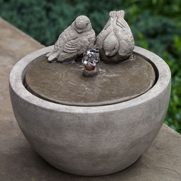 M-Series Bird Fountain on concrete in the backyard