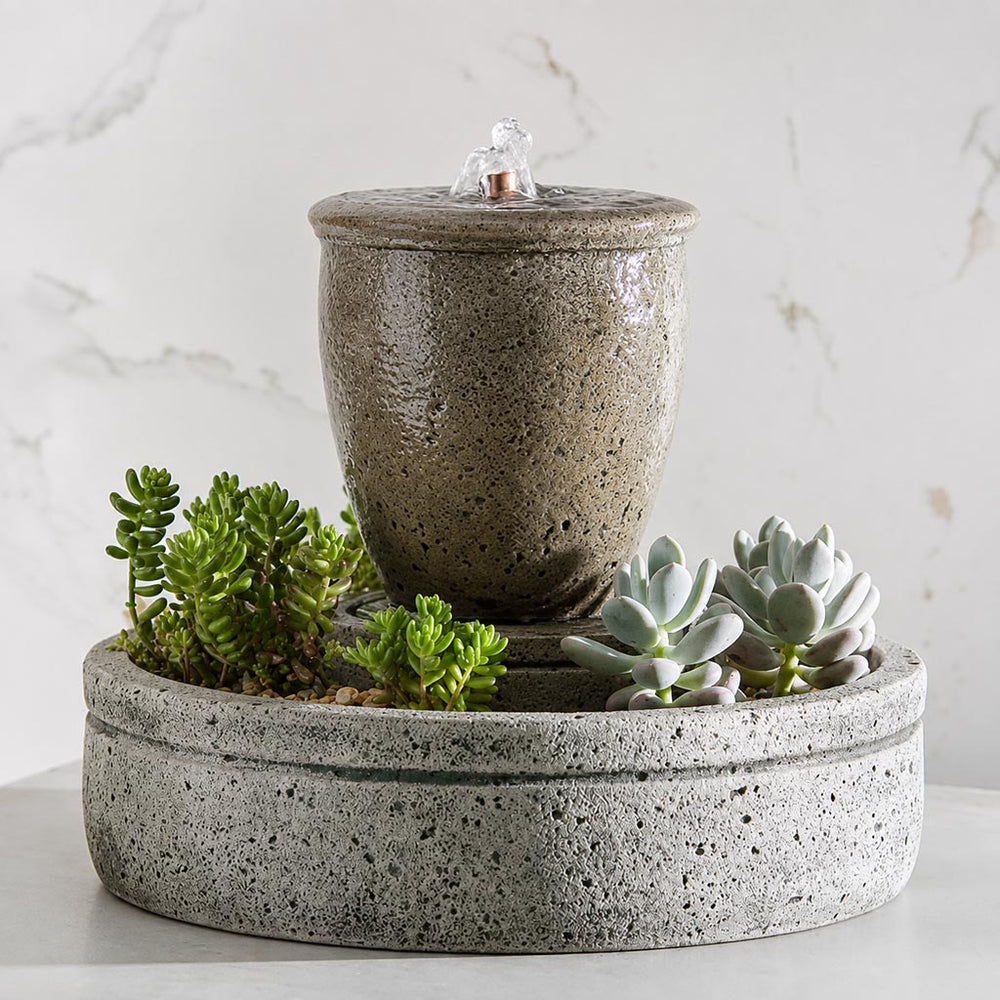 M-Series Rustic Spa Fountain with planter filled with cactus against white background