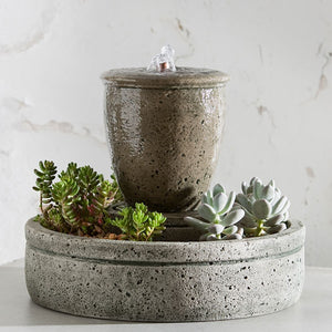 M-Series Rustic Spa Fountain with planter filled with cactus against white background