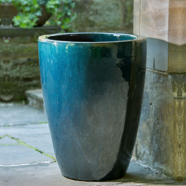 Marta Planter S/3 Indigo Rain on concrete in the backyard